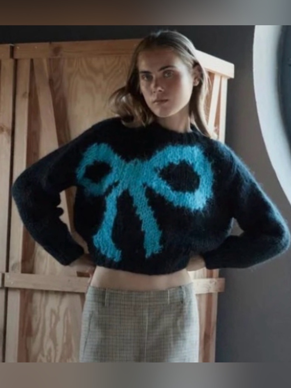 Designer sweater Cropped Black Crewneck Sweater with Blue Bow Motif size small